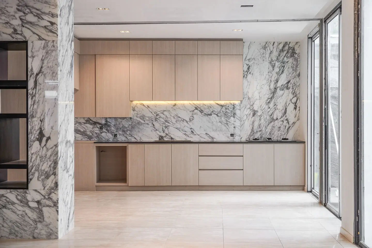 A minimalist house decorated with white Arabescato marble