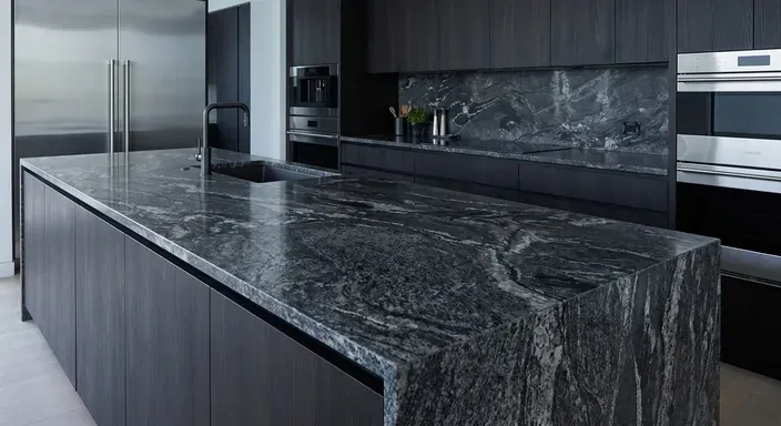 Dark veined stone island in a modern kitchen