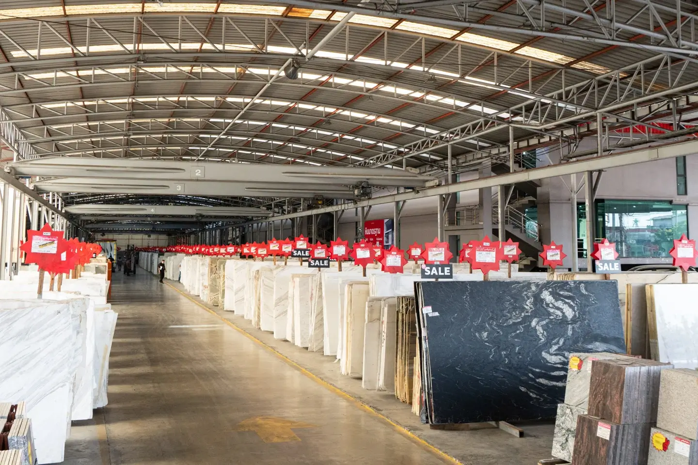Marbles are arranged in the storage area of Siamtak shop