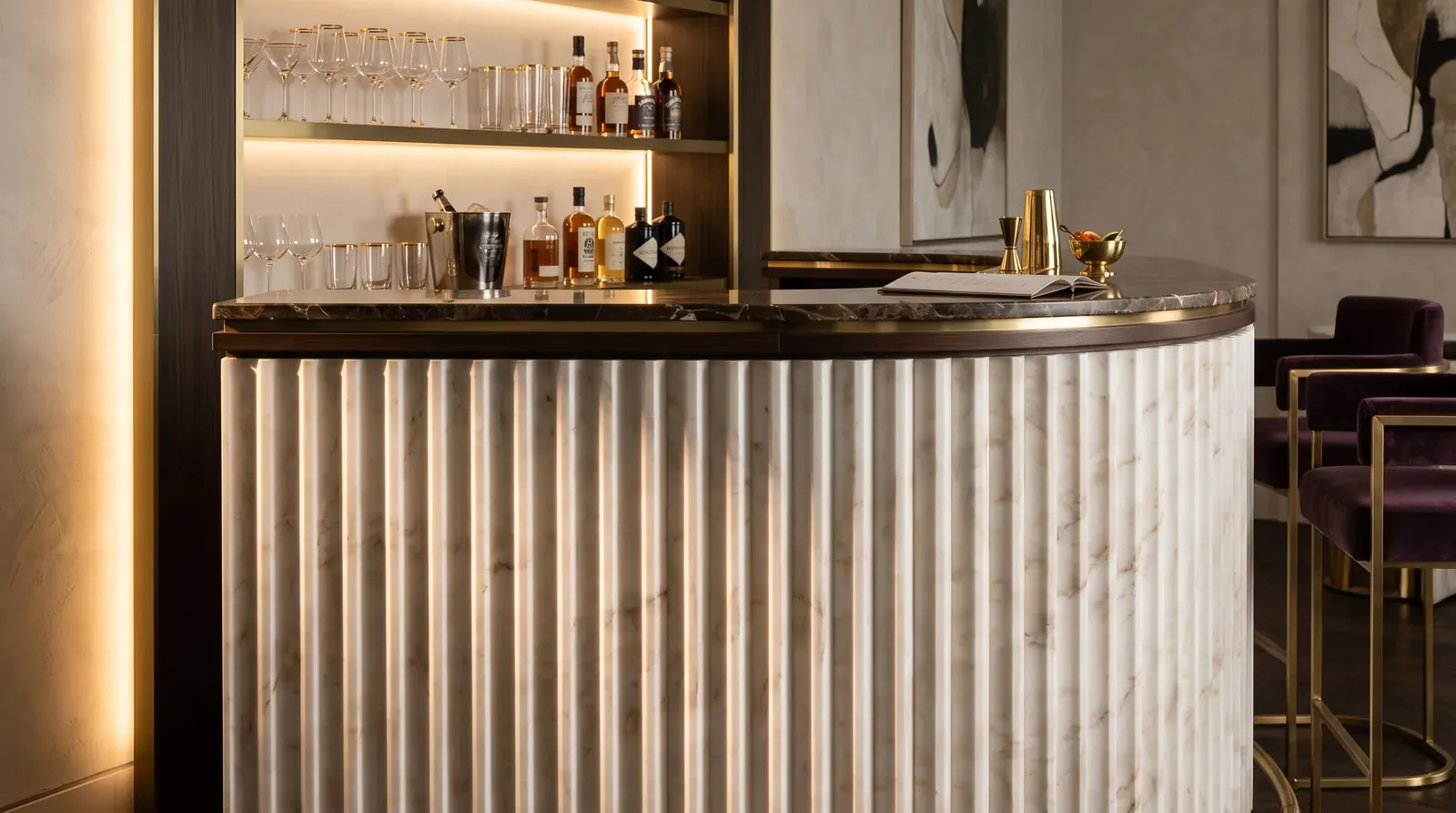 Curved marble bar counter with fluting catching the light