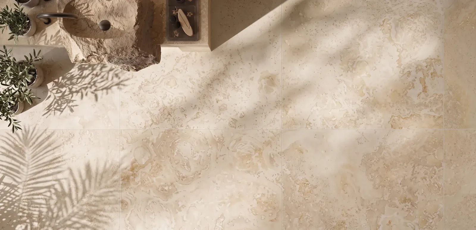 Cross-cut travertine floor with soft cloud-like patterning in natural light